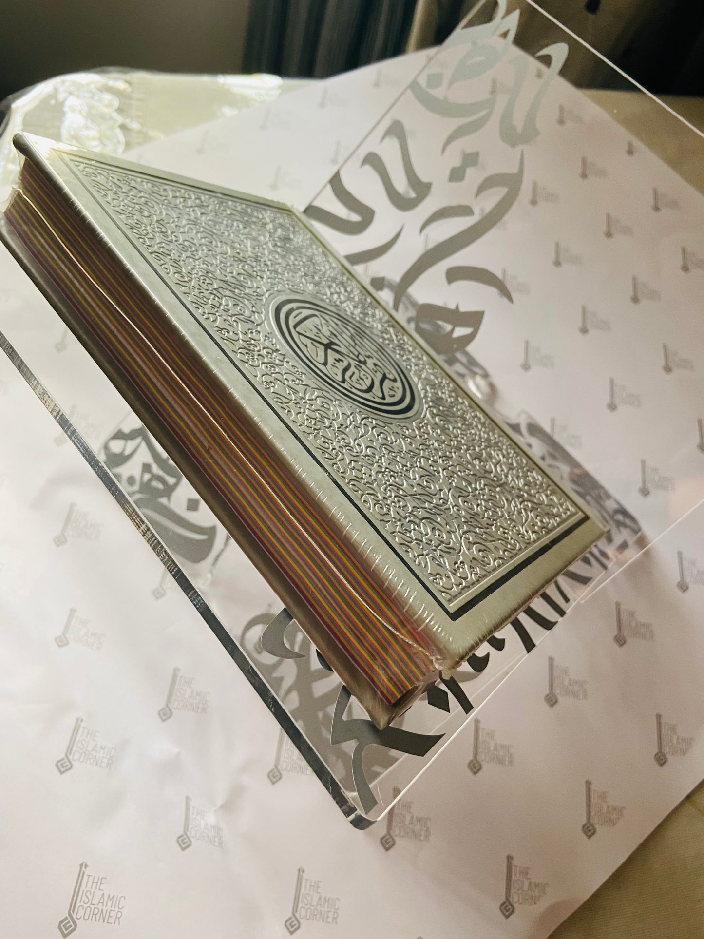 Clear Qur'an Stand with Arabic calligraphy